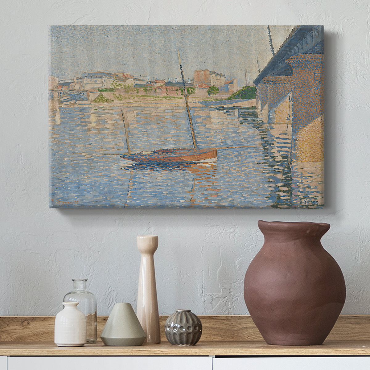 Canvas art print featuring a pointillist harbor view, styled above a decorative console
