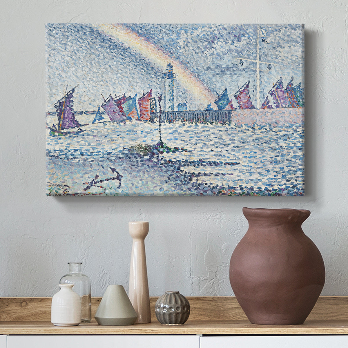 Canvas art print featuring a pointillist harbor entrance with shoreline, styled above a decorative console