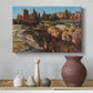 Canvas art print featuring a cityscape with classical ruins and surrounding terrain, styled above a decorative console