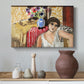 Canvas art print featuring an expressive seated figure with furnishings, styled above a decorative console