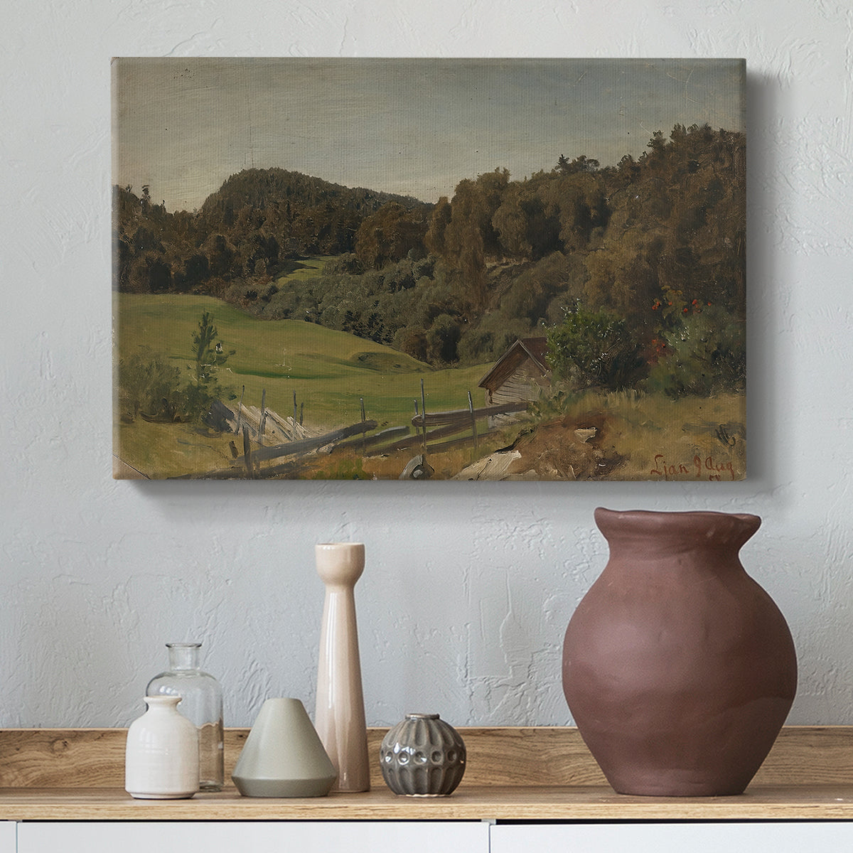Canvas art print featuring a scenic rural landscape with fields and horizon, styled above a decorative console
