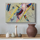 Canvas art print featuring an abstract arrangement combining linear elements and color accents, styled above a decorative console