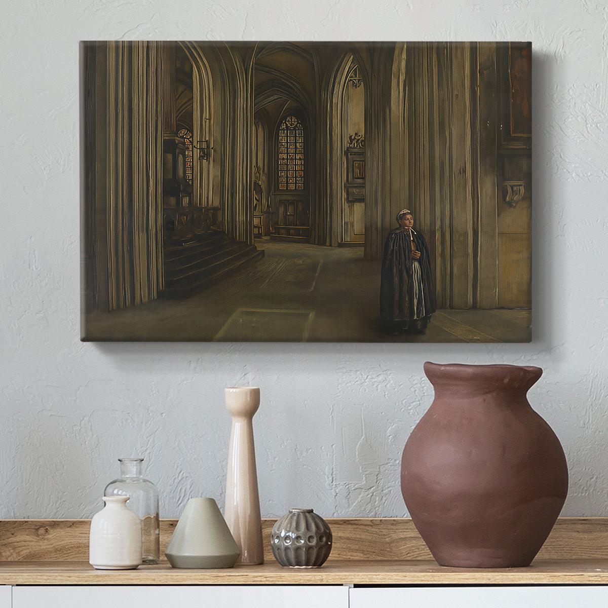 Canvas art print featuring a dimly lit religious building with structural details, styled above a decorative console