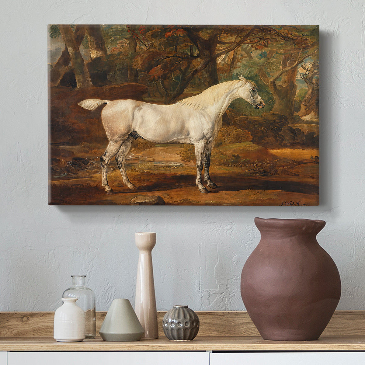 Canvas art print featuring an elegant animal study of stallion in outdoor setting, styled above a decorative console