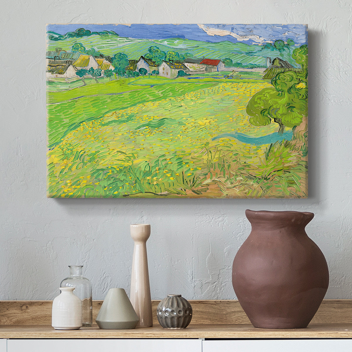 Canvas art print featuring a post-impressionist landscape emphasizing depth and color, styled above a decorative console