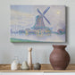 Canvas art print featuring a countryside view with windmill, styled above a decorative console