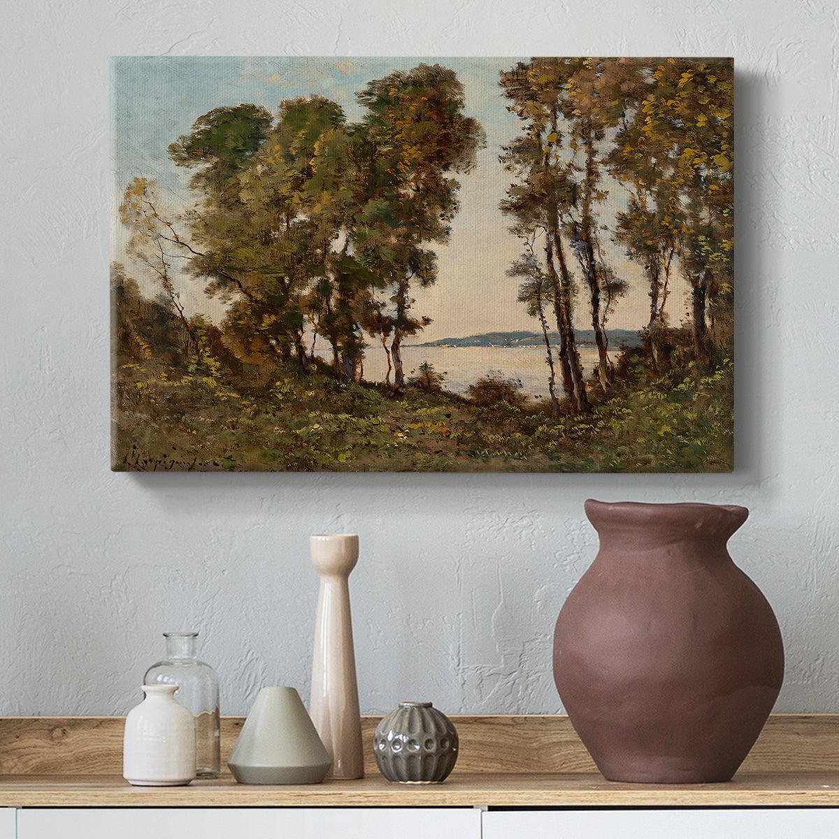 Canvas art print featuring a natural landscape with water and dense greenery, styled above a decorative console