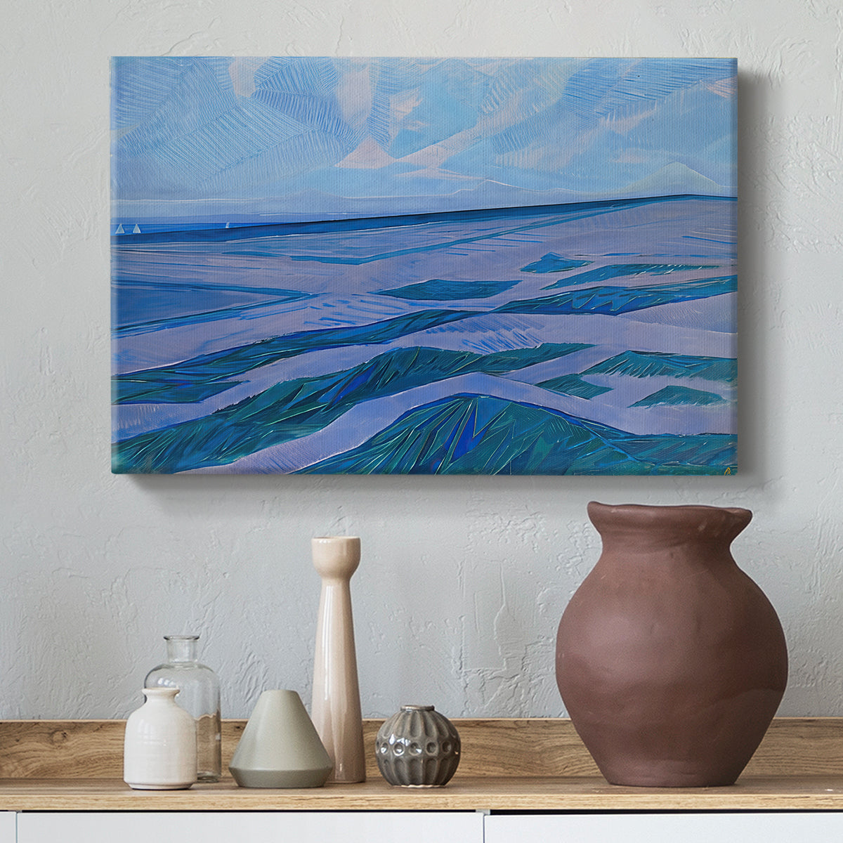 Canvas art print featuring flattened landscape forms, styled above a decorative console