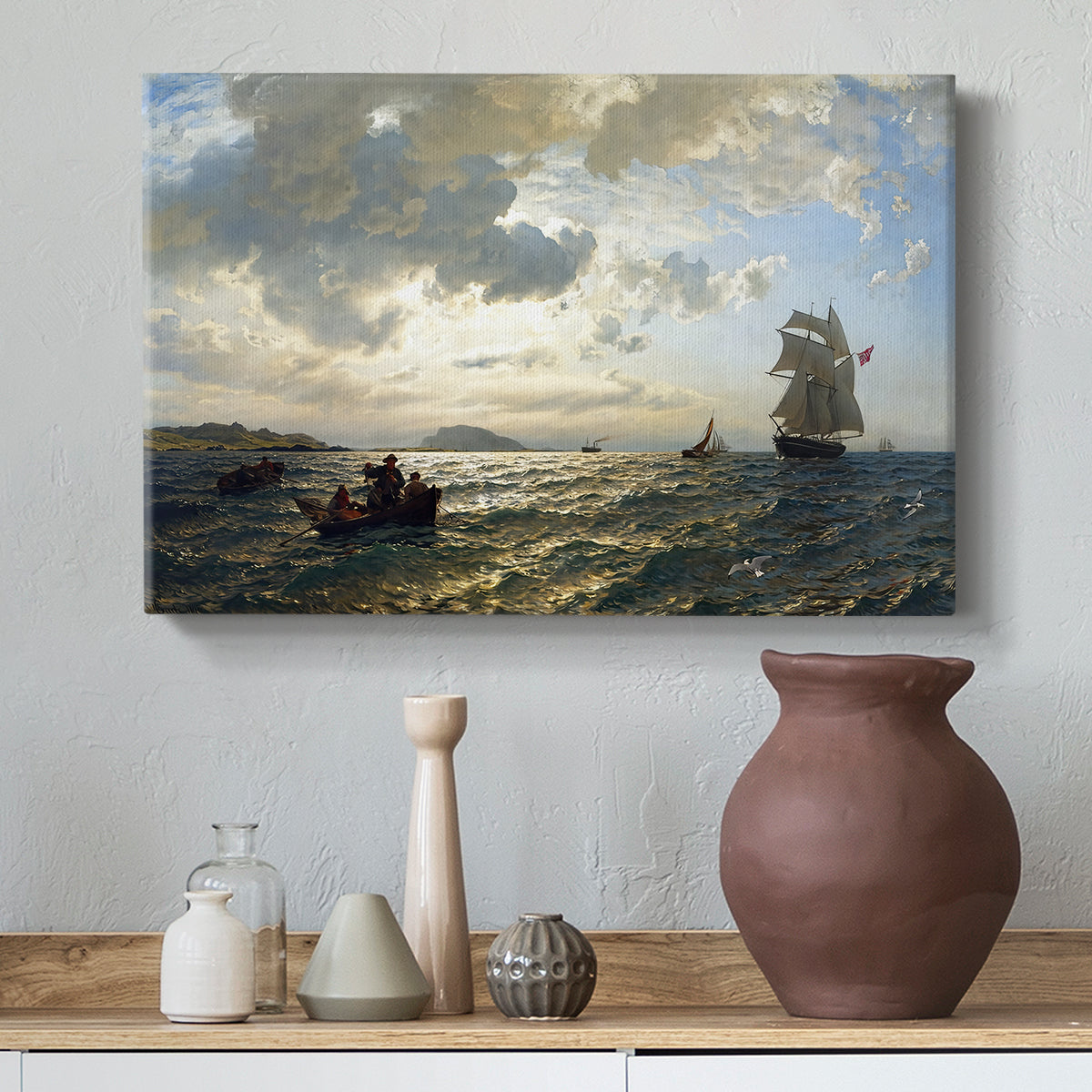 Canvas art print featuring a nautical landscape with boats in light coastal wind, styled above a decorative console