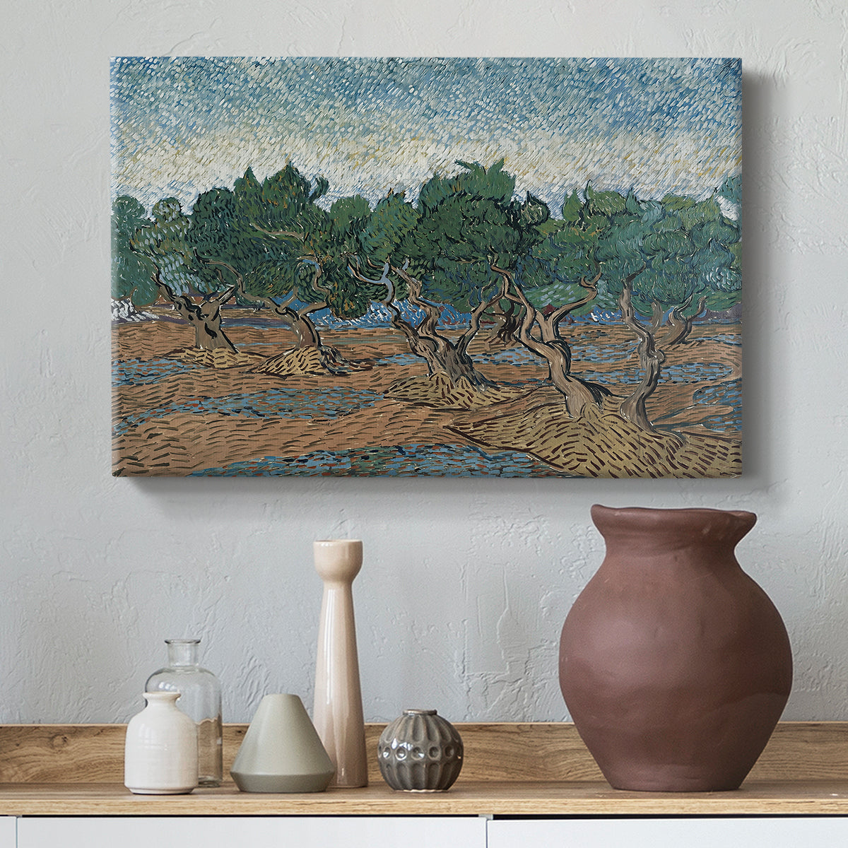 Canvas art print featuring a post-impressionist scene emphasizing movement in foliage, styled above a decorative console