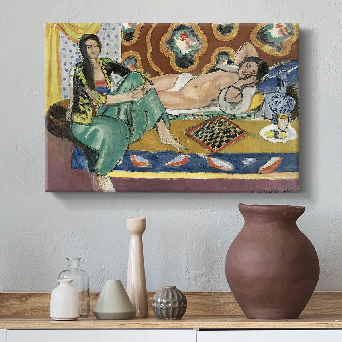 Canvas art print featuring a Fauvist composition of two seated figures at play, styled above a decorative console