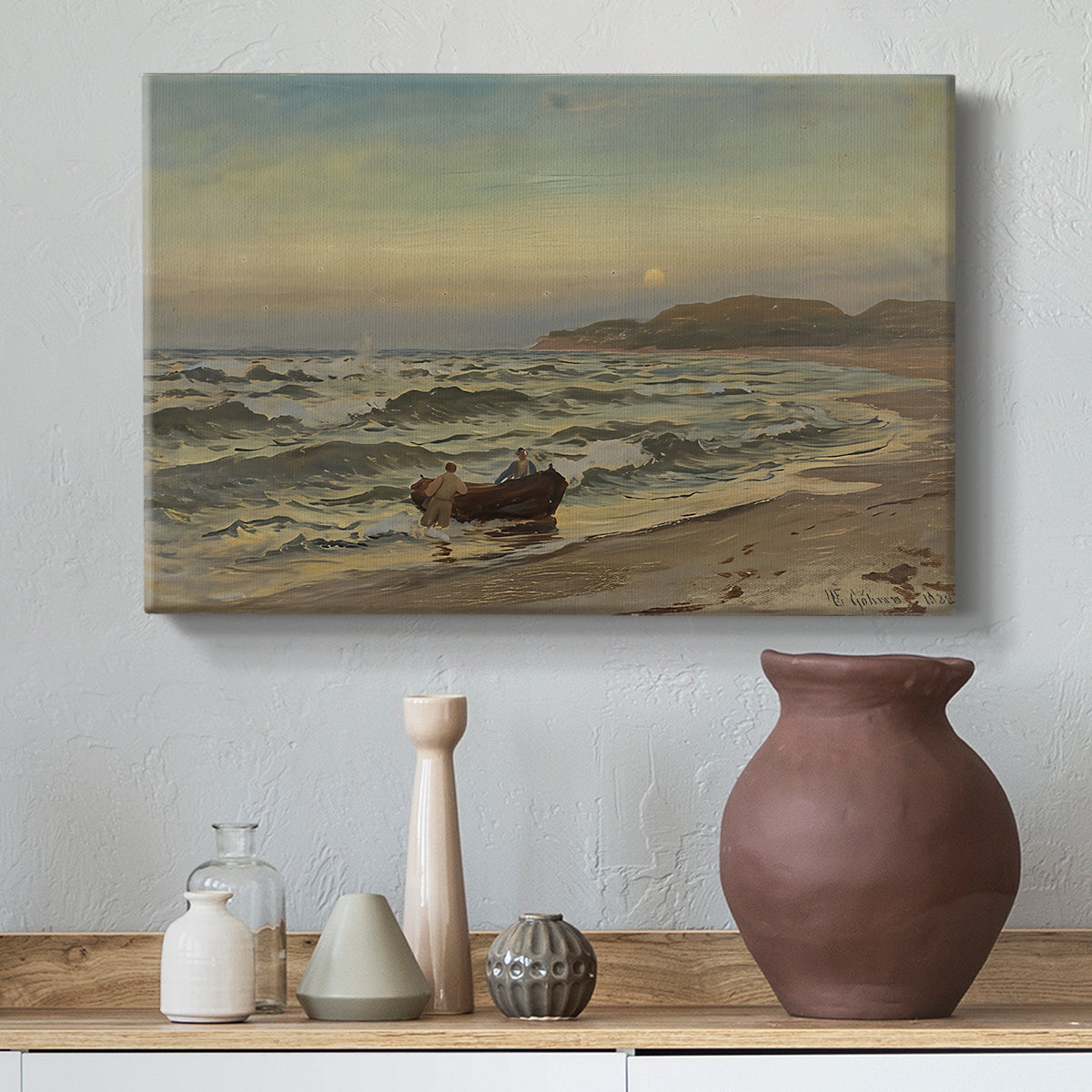 Canvas art print featuring a moody maritime landscape with storm clouds over ocean, styled above a decorative console