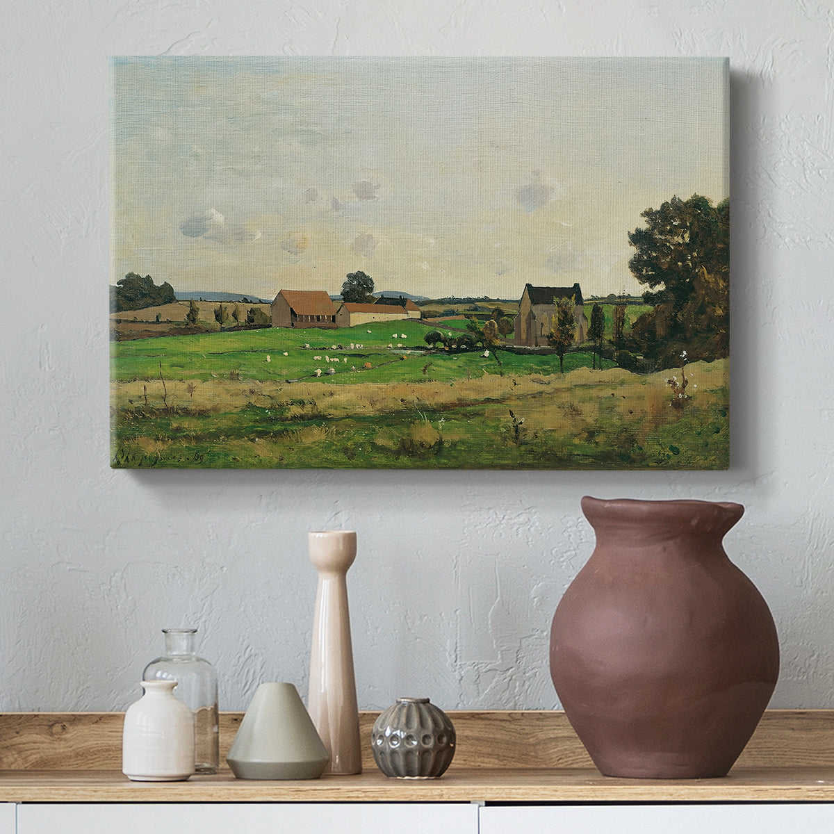 Canvas art print featuring a rural scene with estate and surrounding greenery, styled above a decorative console