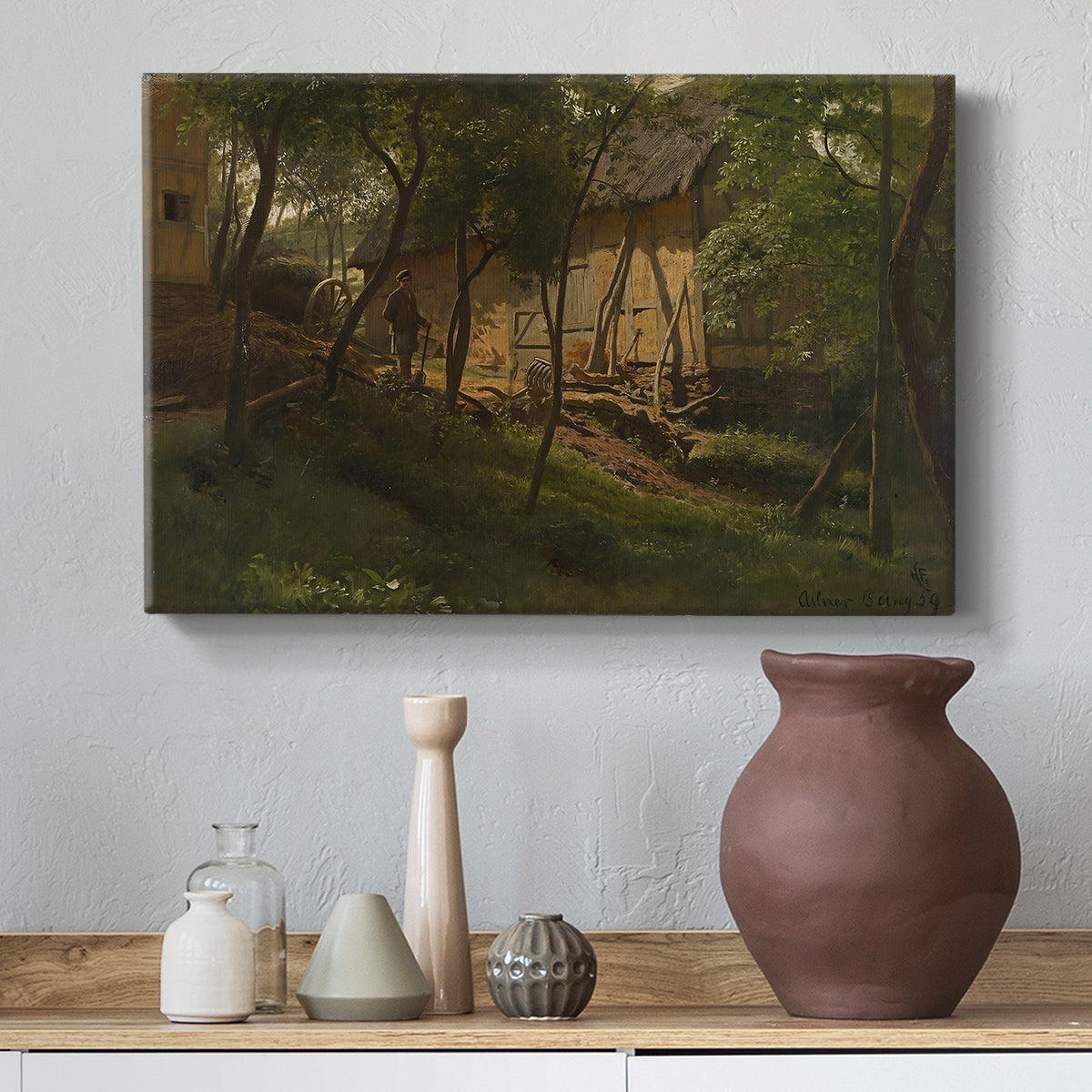 Canvas art print featuring a pastoral environment with farmhouse and vegetation, styled above a decorative console