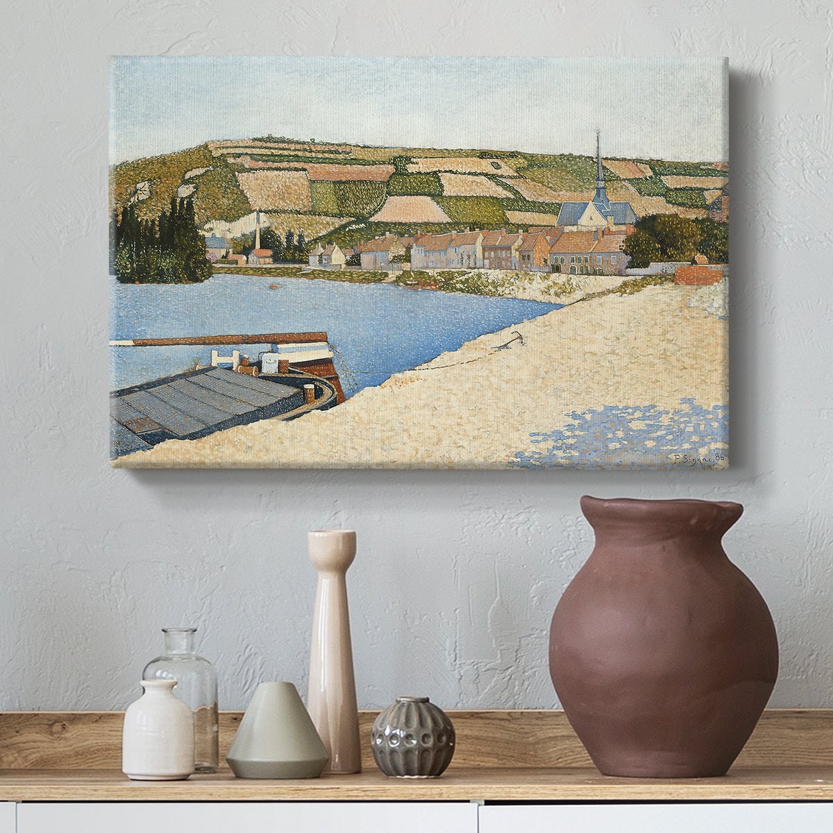 Canvas art print featuring a landscape with shoreline and architecture, styled above a decorative console