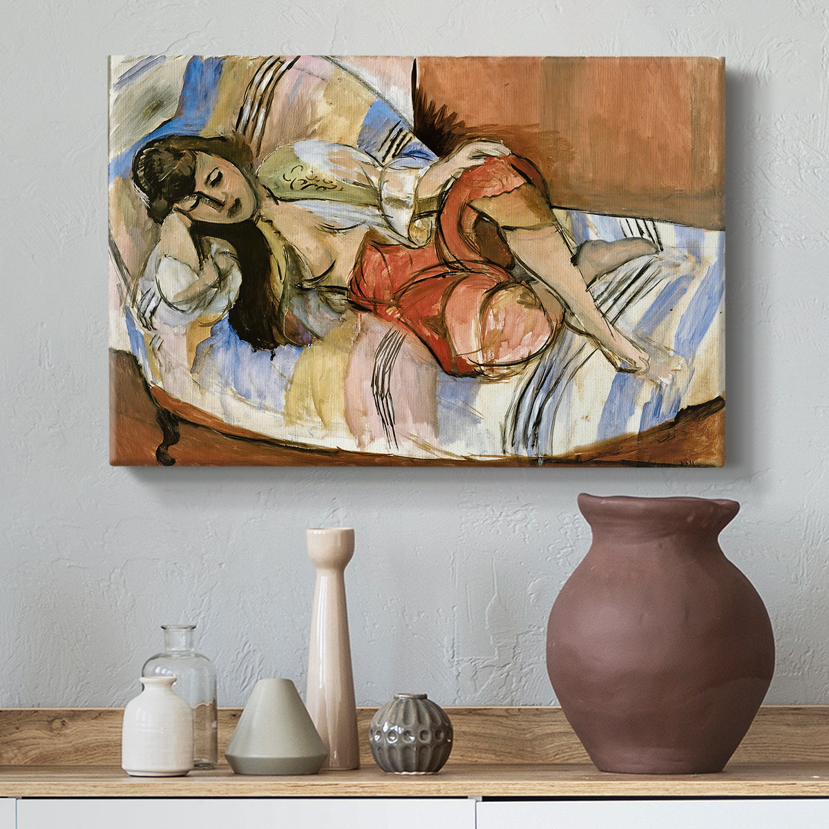 Canvas art print featuring a stylized reclining female figure in an ornate interior, styled above a decorative console