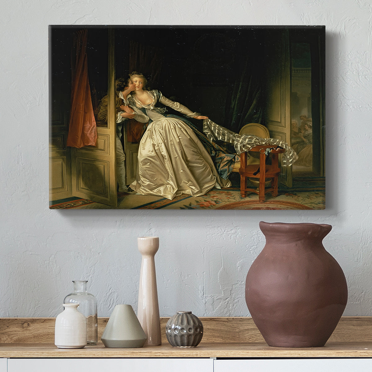 Canvas art print featuring an expressive composition of figures in close interaction indoors, styled above a decorative console