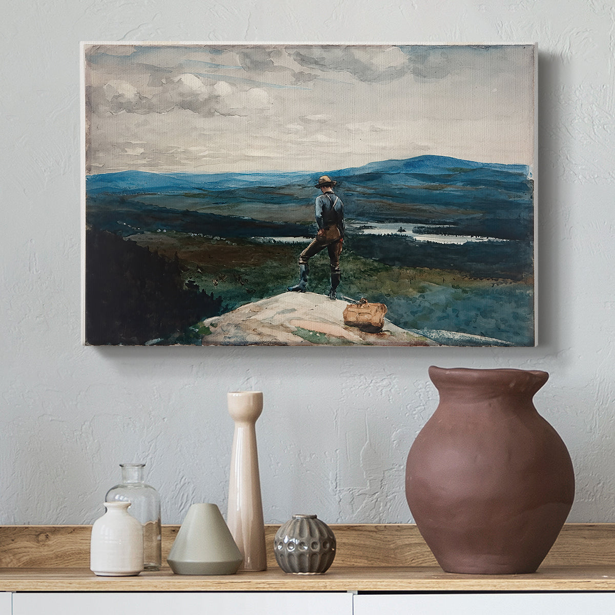 Canvas art print featuring a composition combining figure, water, and distant landscape, styled above a decorative console