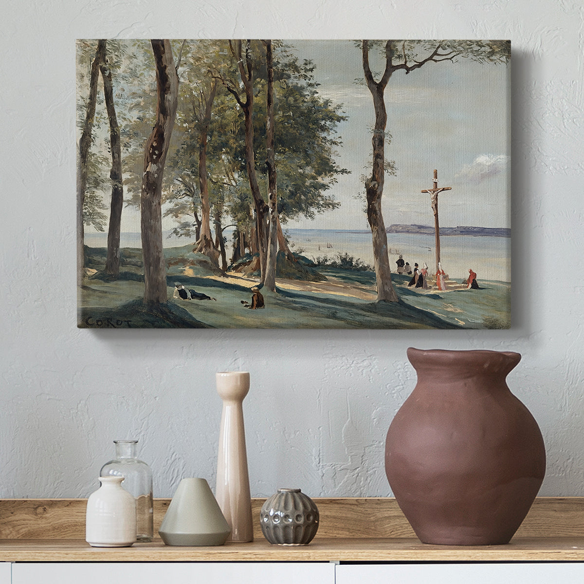 Canvas art print featuring a soft landscape combining nature and spiritual monument, styled above a decorative console