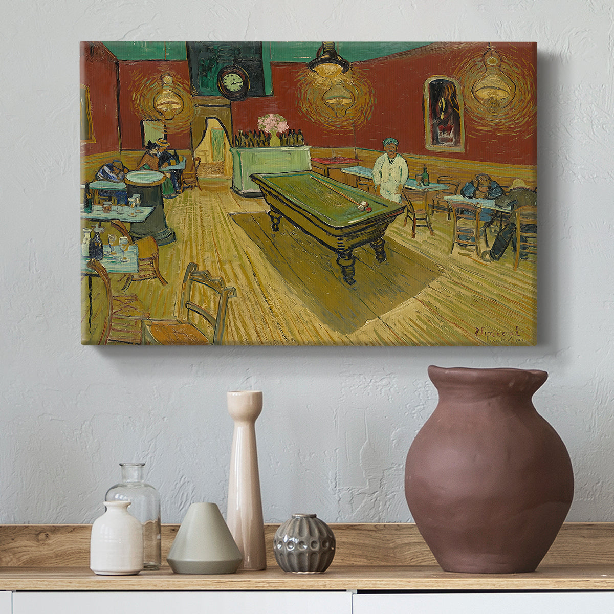 Canvas art print featuring a post-impressionist café setting with vivid color contrast and empty tables, styled above a decorative console