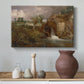 Canvas art print featuring an architectural landscape with rustic building, styled above a decorative console