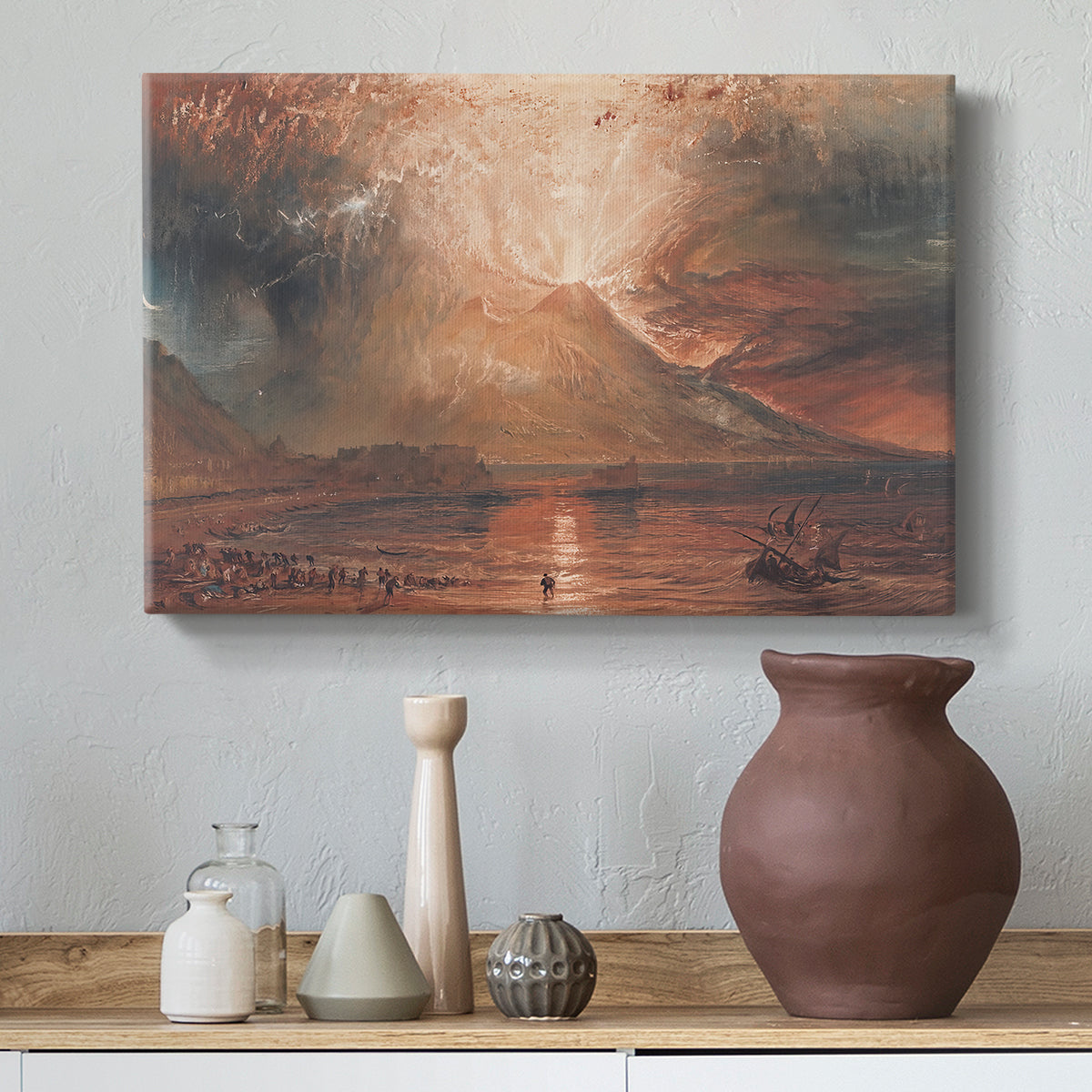 Canvas art print featuring an expressive depiction of erupting volcano, styled above a decorative console