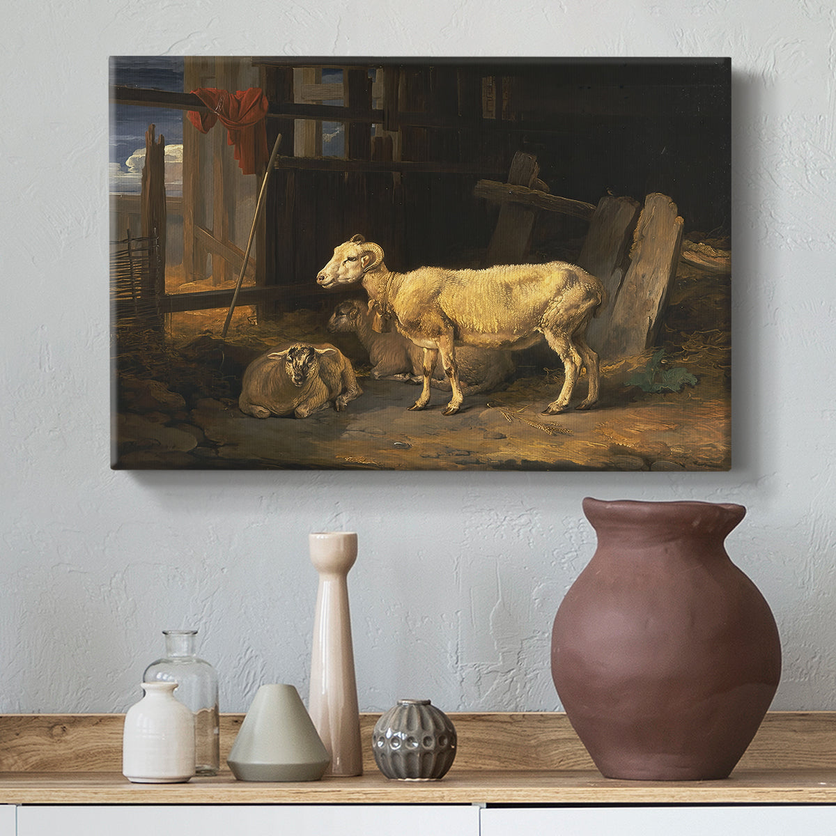 Canvas art print featuring an interior scene with sheep in agricultural setting, styled above a decorative console