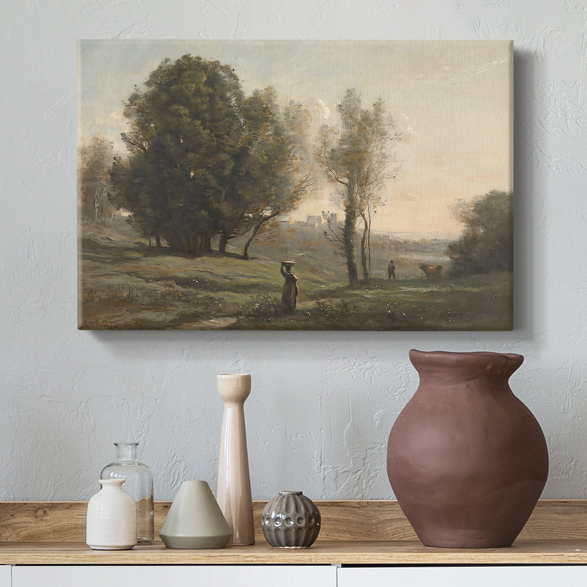 Canvas art print featuring a tranquil landscape with distant horizon and soft tones, styled above a decorative console