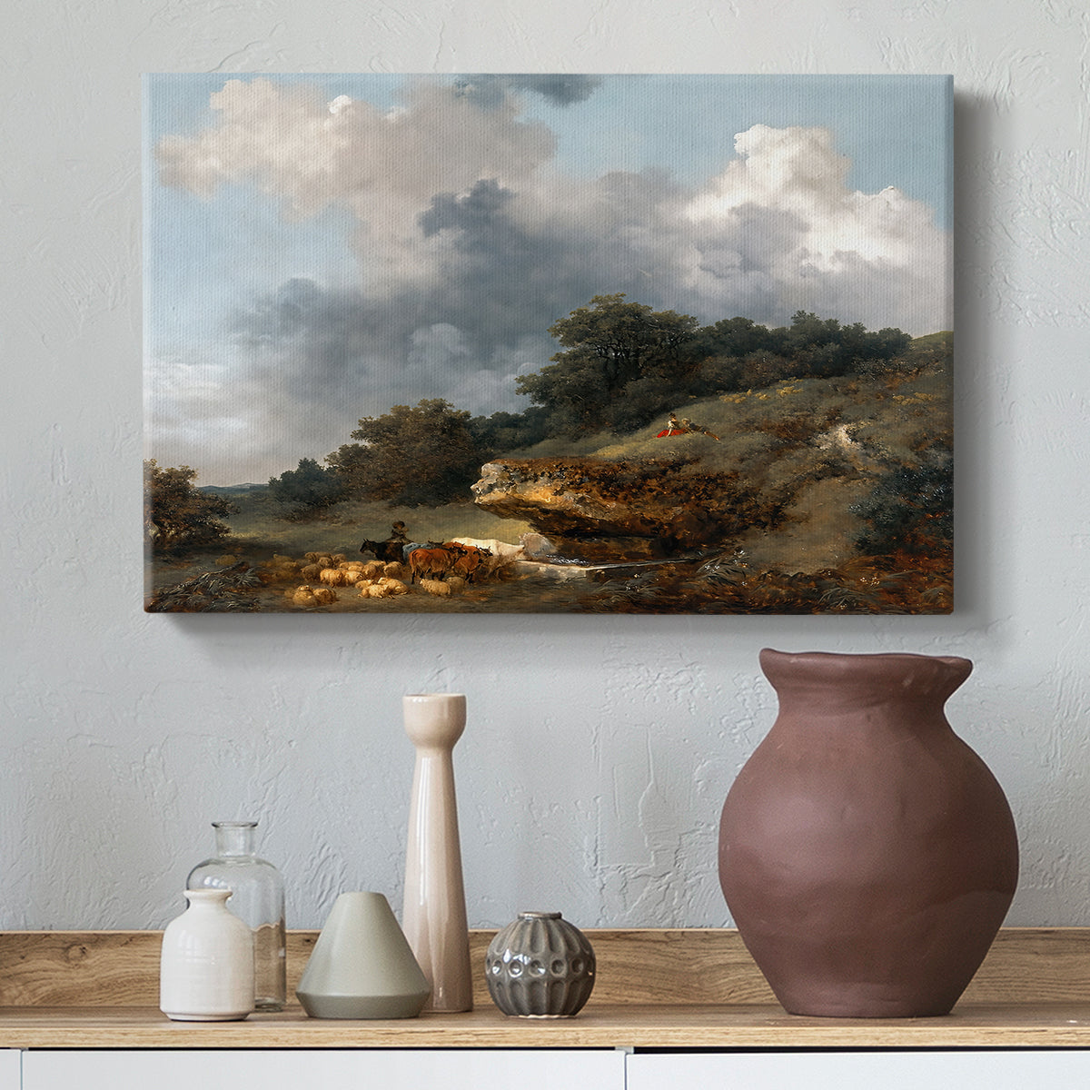 Canvas art print featuring a Rococo landscape with figures in natural setting, styled above a decorative console