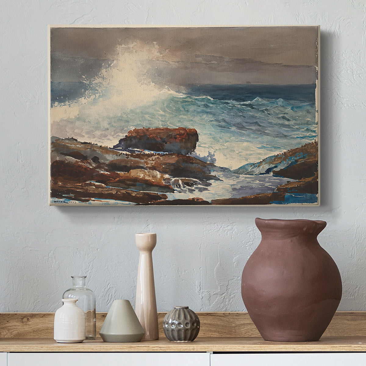 Canvas art print featuring a beach composition with tide movement and structures, styled above a decorative console
