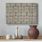 Canvas art print featuring a patterned textile featuring repeated flowers and leaves, styled above a decorative console