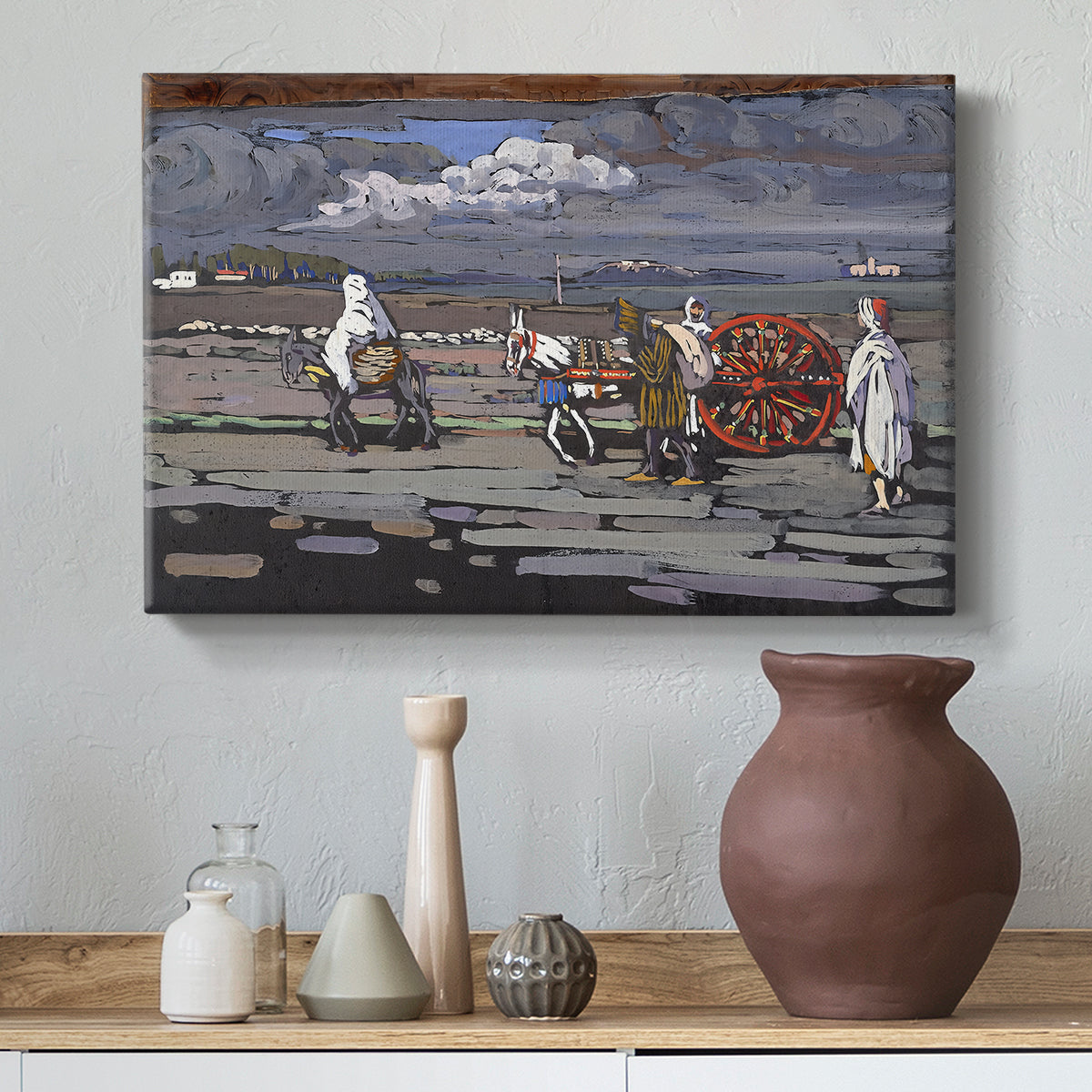 Canvas art print featuring an expressive composition combining road, figures, and terrain, styled above a decorative console