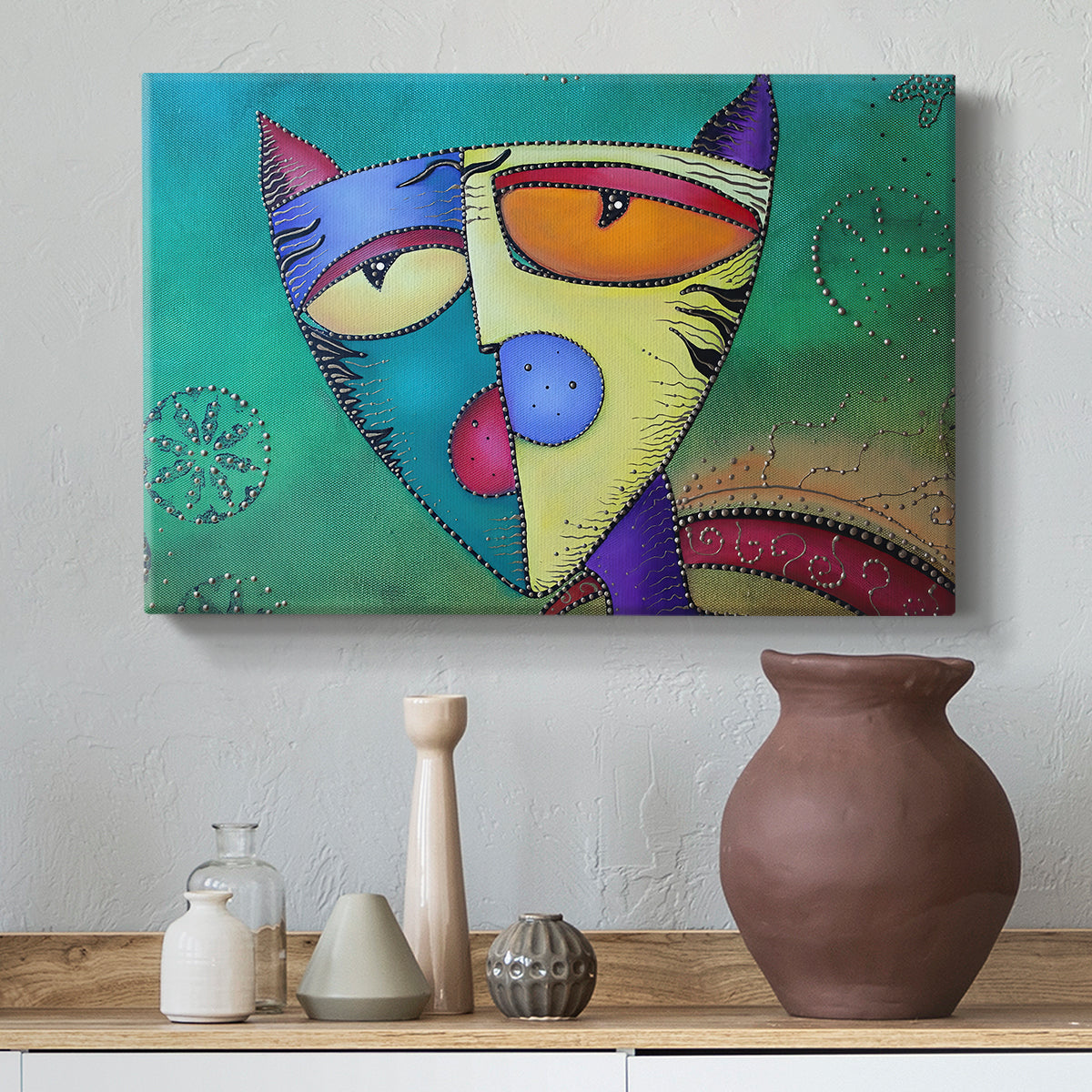 Canvas art print featuring an abstract animal with bright colors, styled above a decorative console