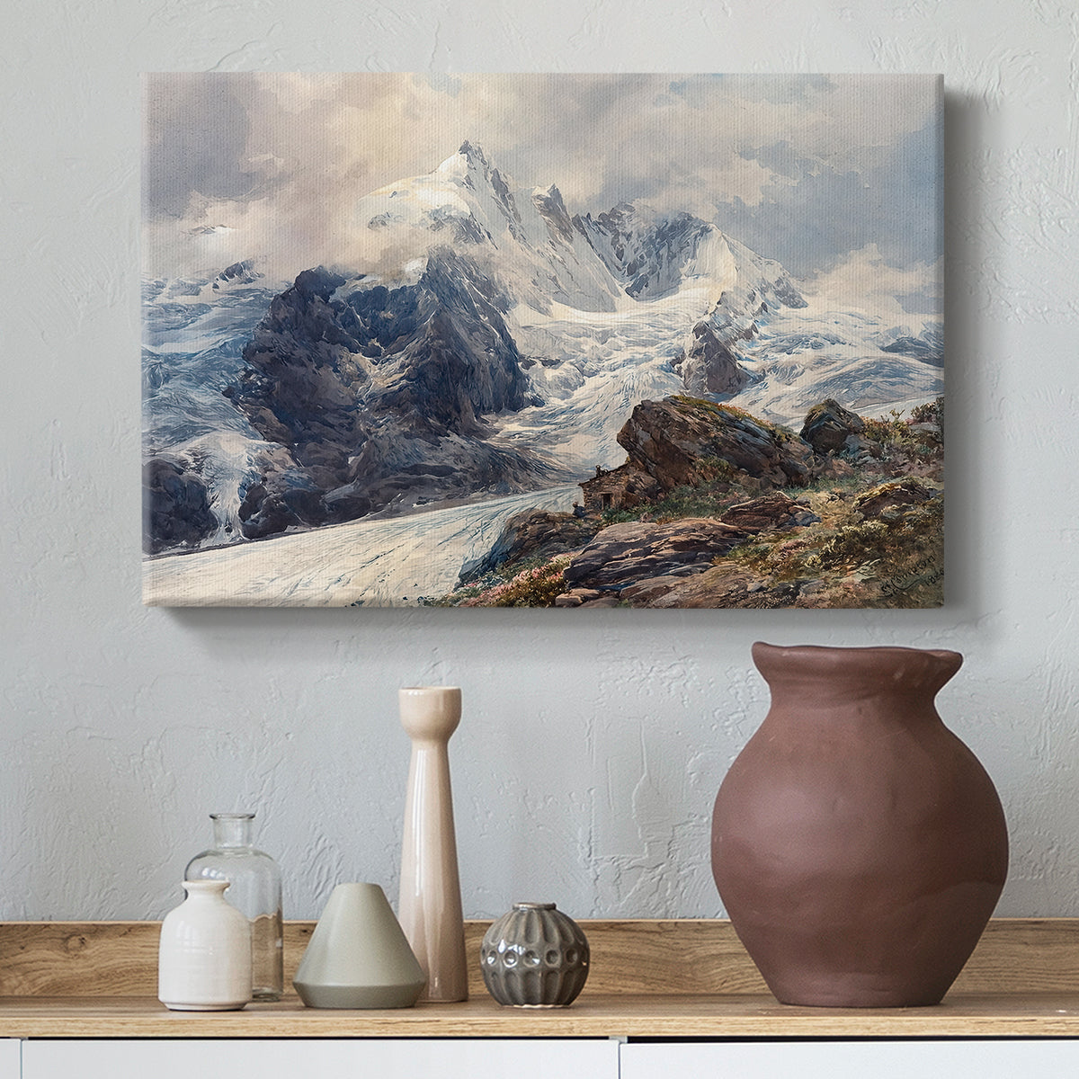 Canvas art print featuring a realistic landscape of high mountain under open sky, styled above a decorative console
