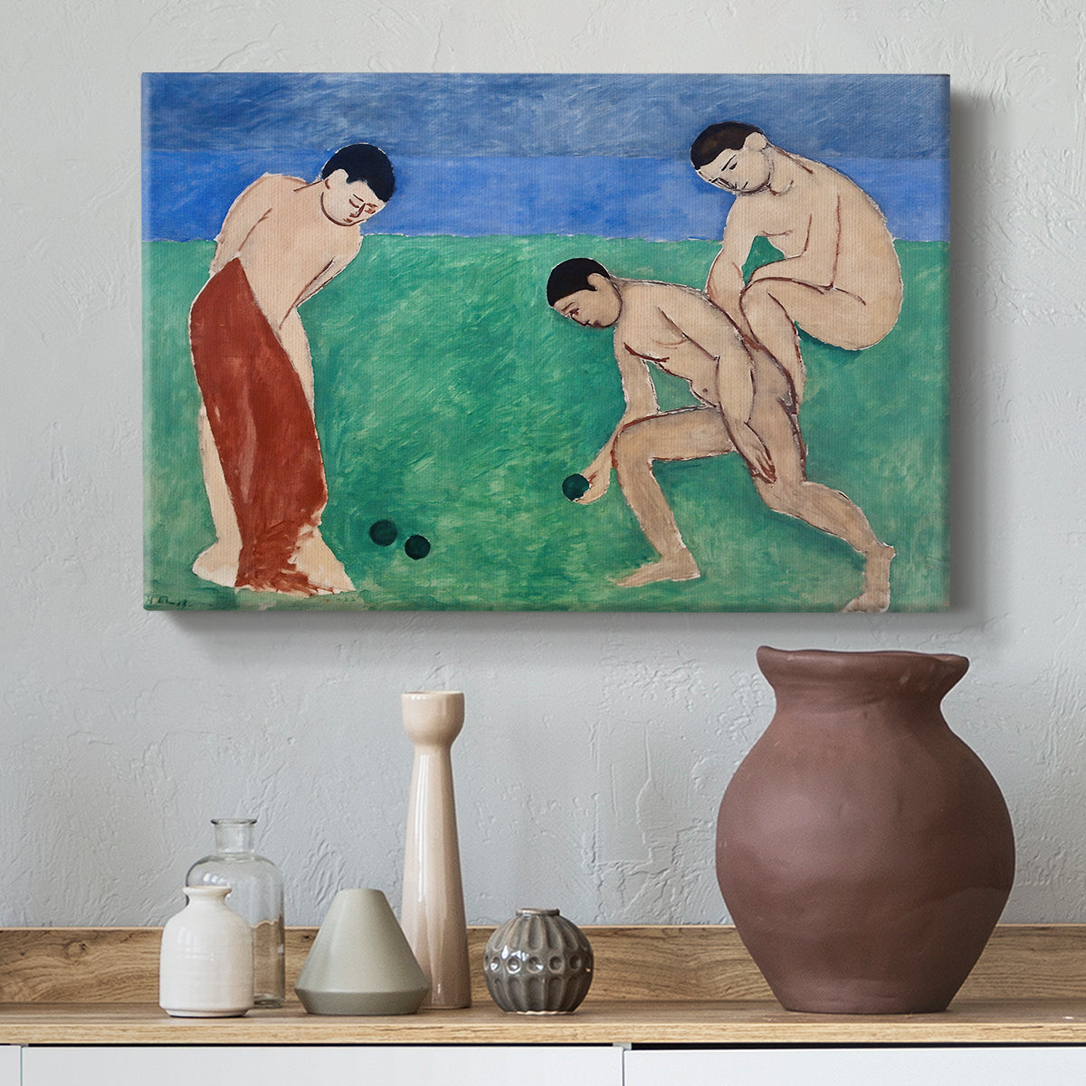 Canvas art print featuring a stylized figures interacting in a bright open field, styled above a decorative console
