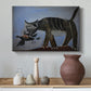 Canvas art print featuring an expressive predator interaction, styled above a decorative console