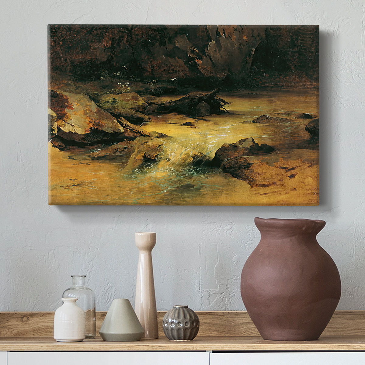 Canvas art print featuring a natural landscape with moving water, styled above a decorative console