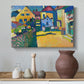 Canvas art print featuring a simplified town scene with bold blocks of color and defined outlines, styled above a decorative console