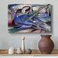 Canvas art print featuring an abstract horse form rendered with soft curves and vivid tones, styled above a decorative console