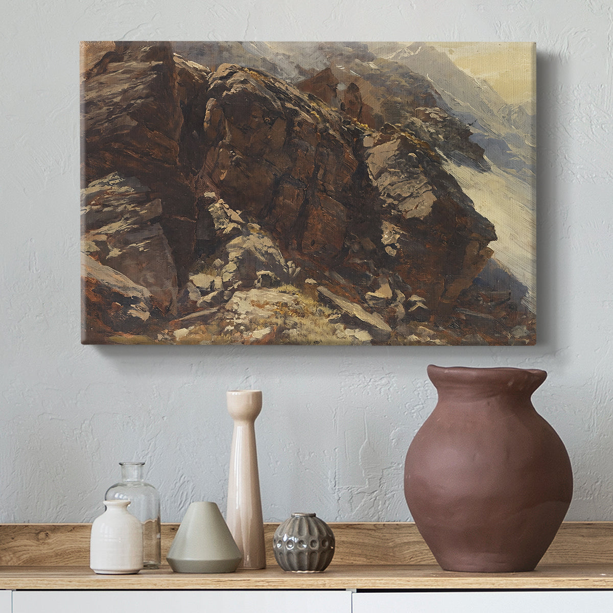 Canvas art print featuring a high-altitude scene with rocky formations and sparse vegetation, styled above a decorative console