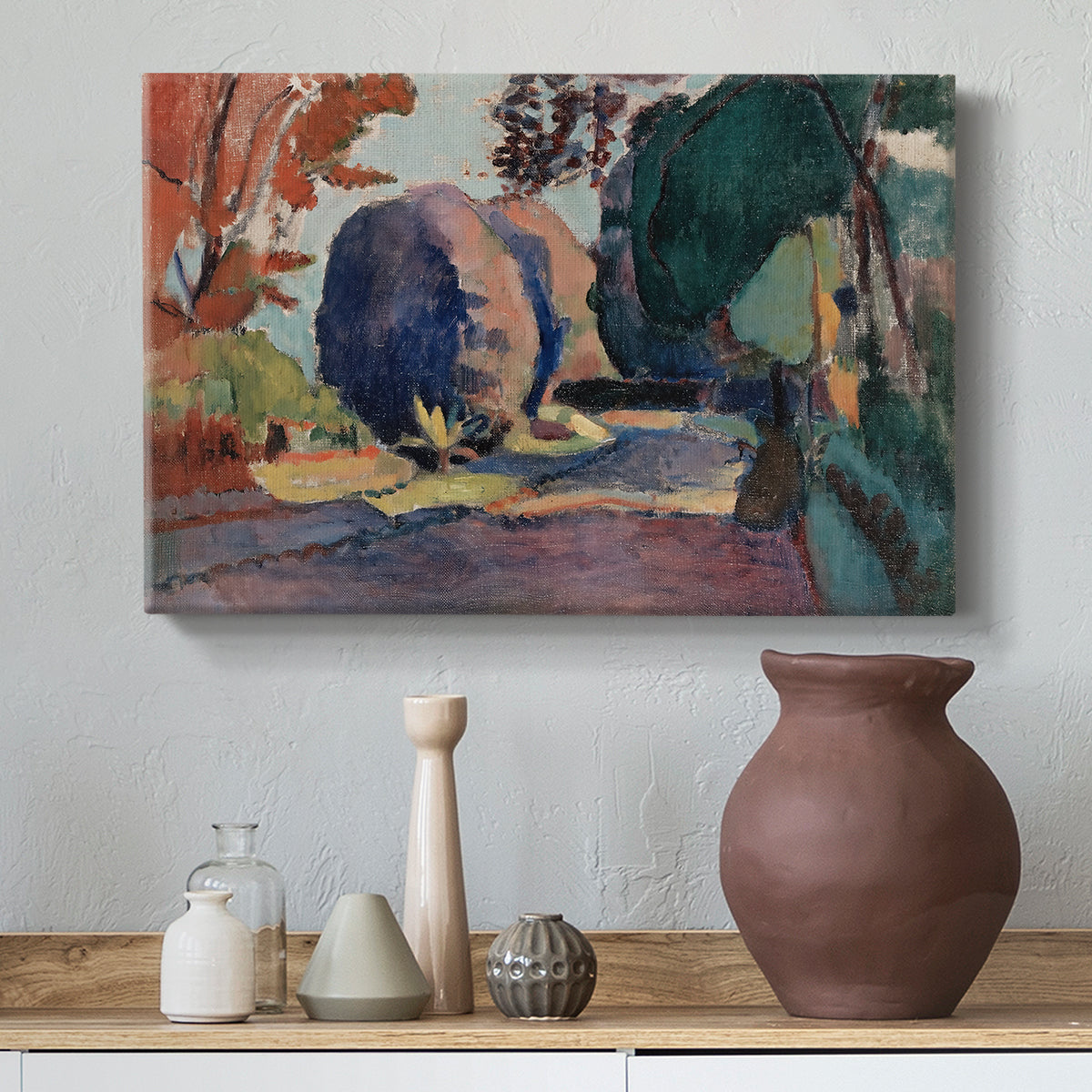 Canvas art print featuring a stylized garden composition with vegetation, styled above a decorative console