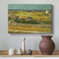 Canvas art print featuring an expressive landscape combining figures and farmland, styled above a decorative console