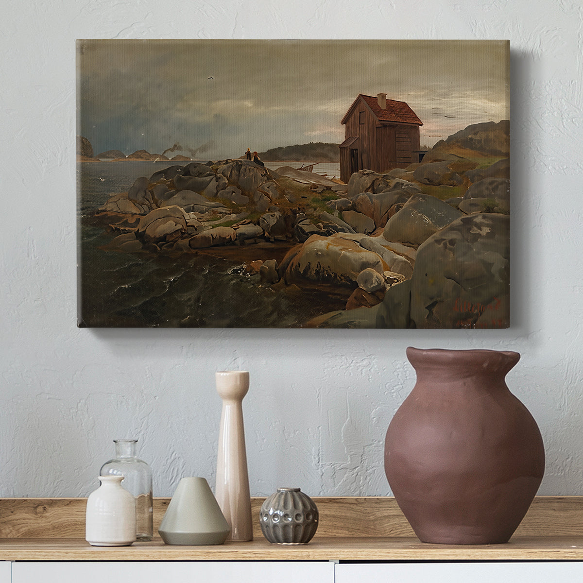 Canvas art print featuring a rustic coastal scene with house and maritime elements, styled above a decorative console