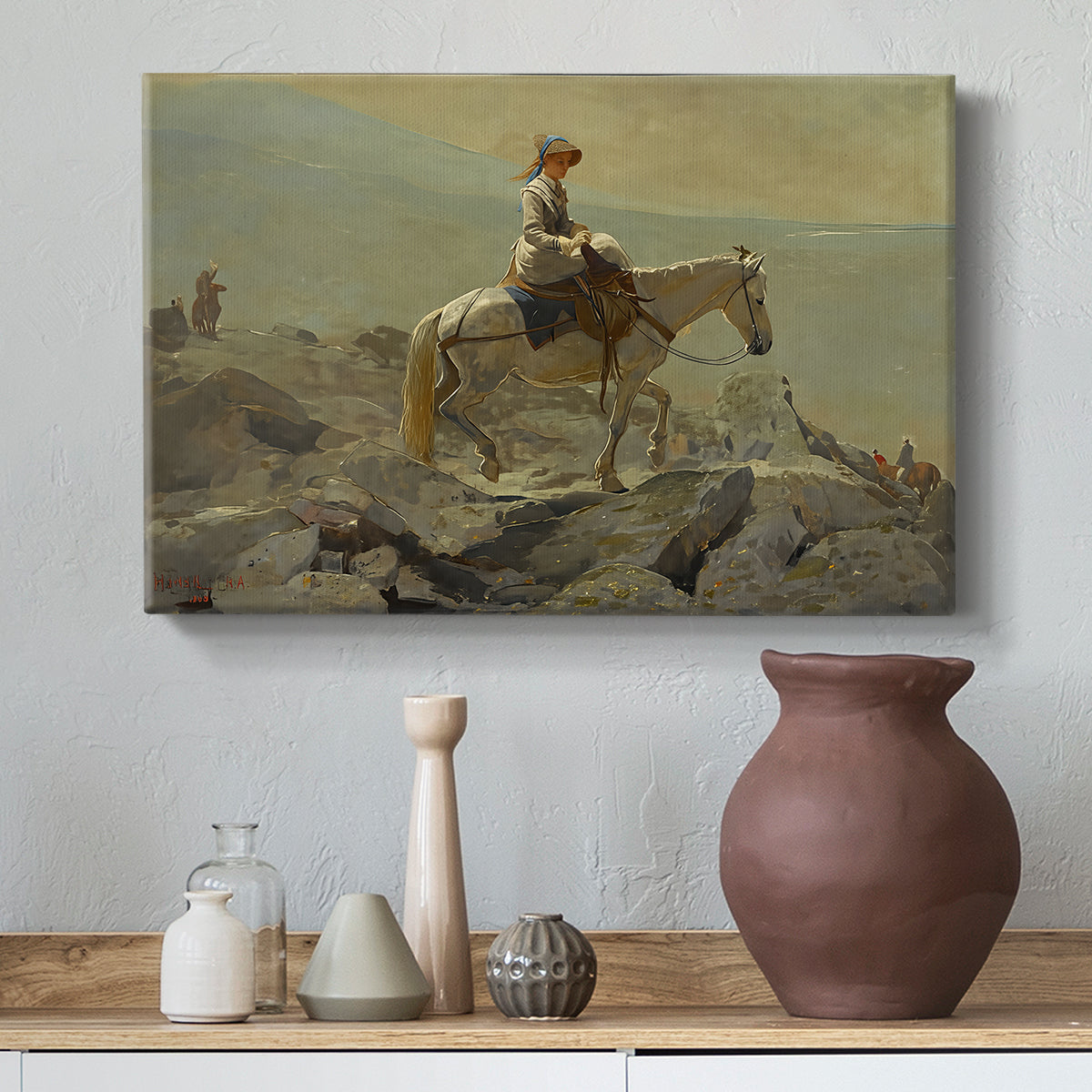 Canvas art print featuring a mountainous composition with person and horse in open terrain, styled above a decorative console