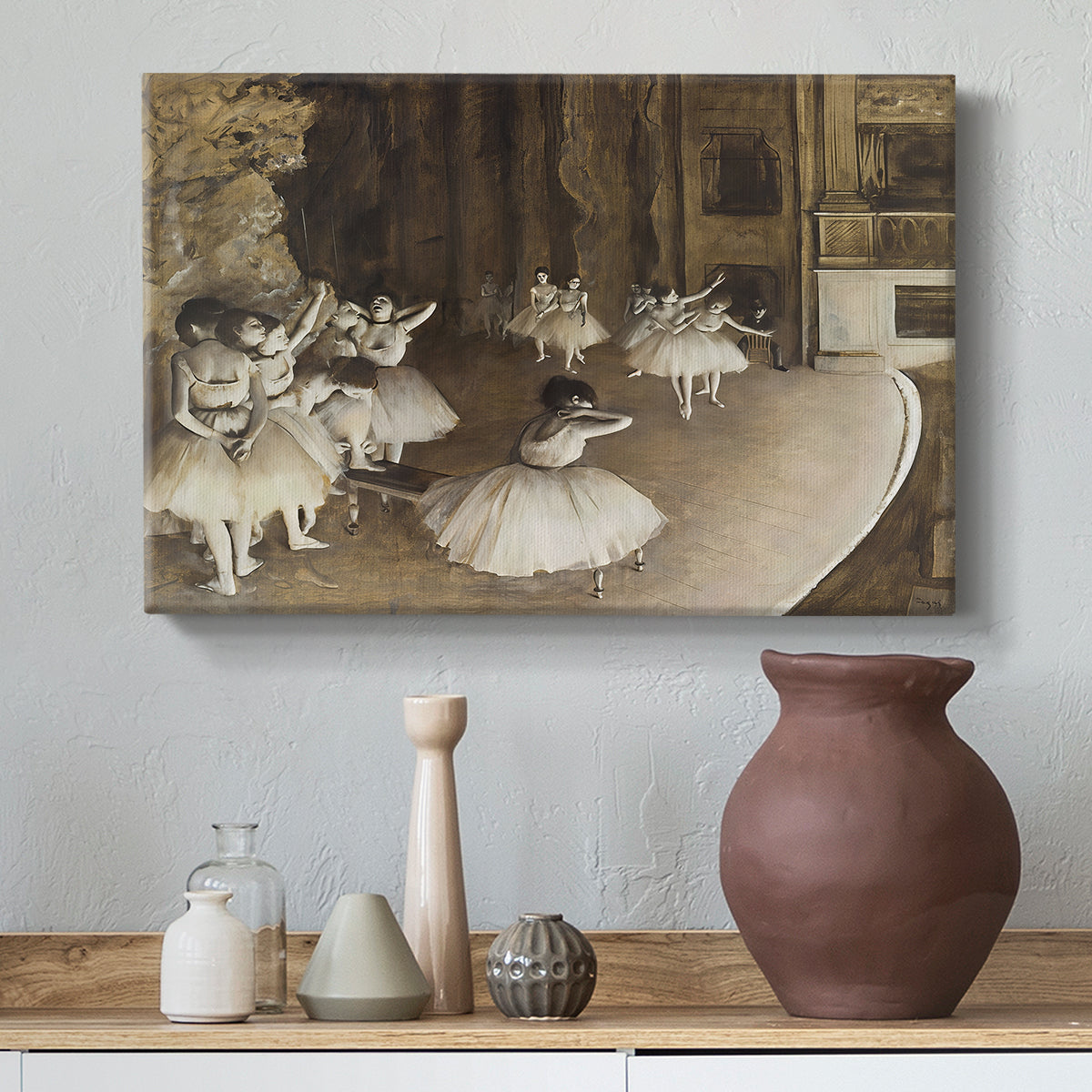 Canvas art print featuring an impressionist depiction of ballet practice on theater stage, styled above a decorative console