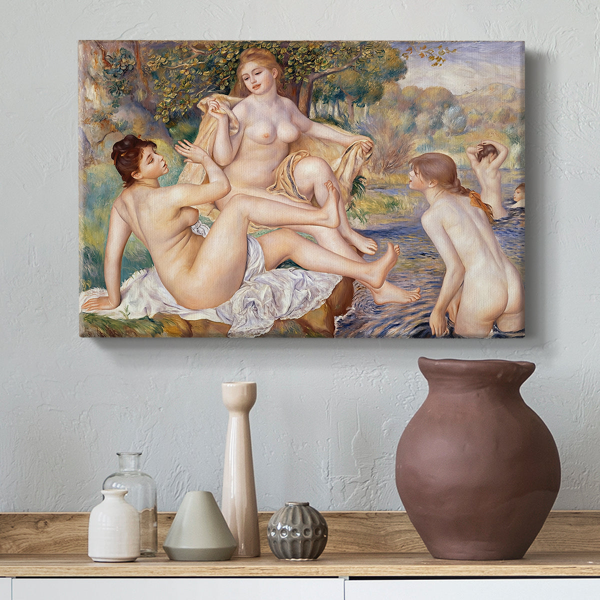 Canvas art print featuring a classical-inspired composition of nude figures in lush riverside setting, styled above a decorative console