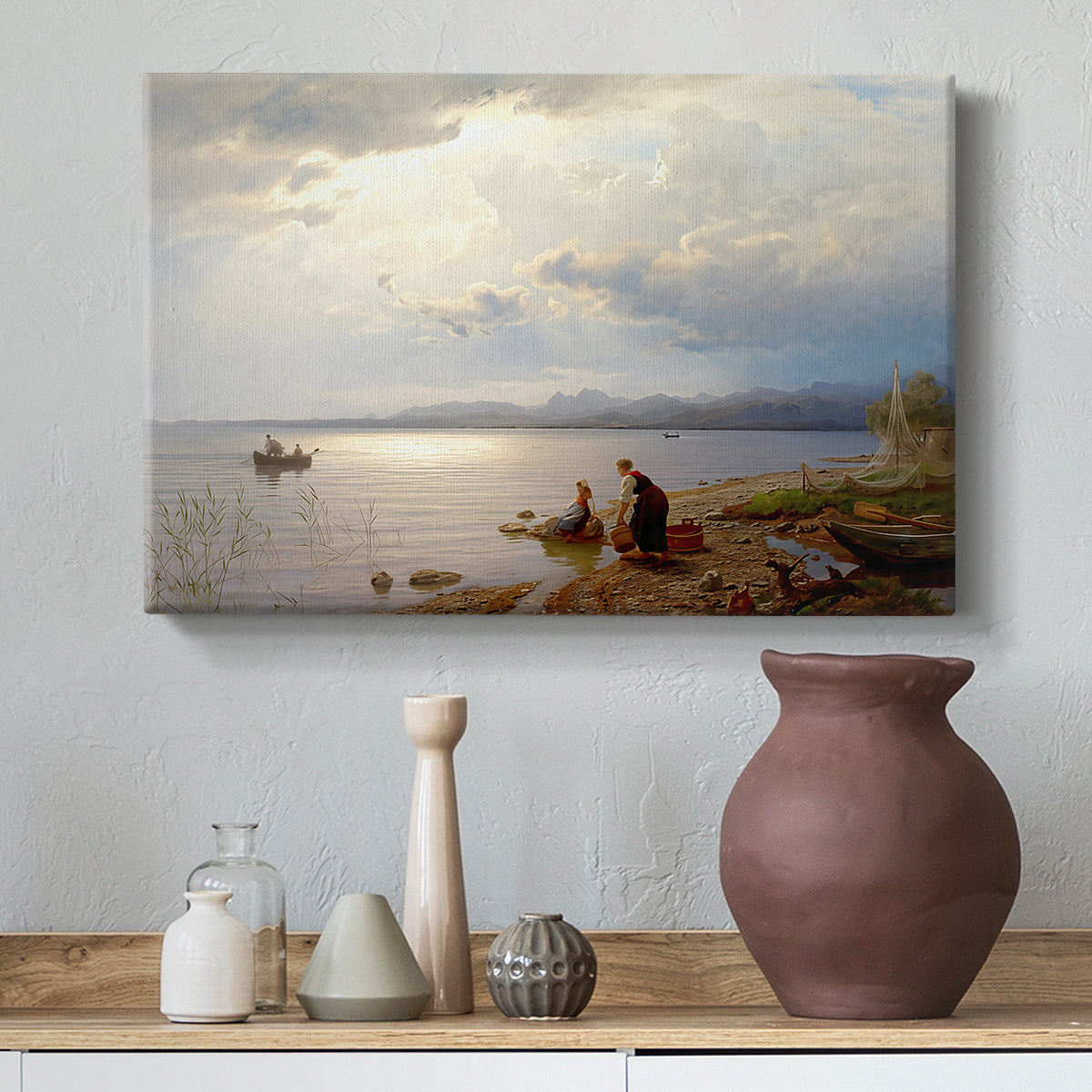 Canvas art print featuring an expansive composition combining figures and open water, styled above a decorative console