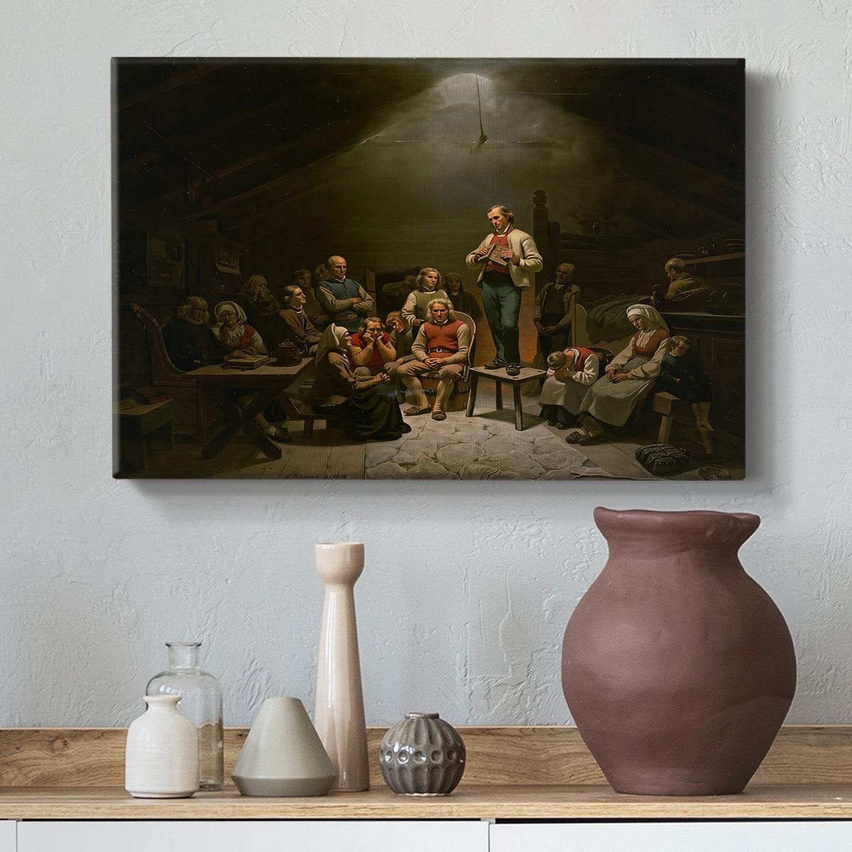 Canvas art print featuring a rural religious gathering with people listening attentively in modest interior, styled above a decorative console