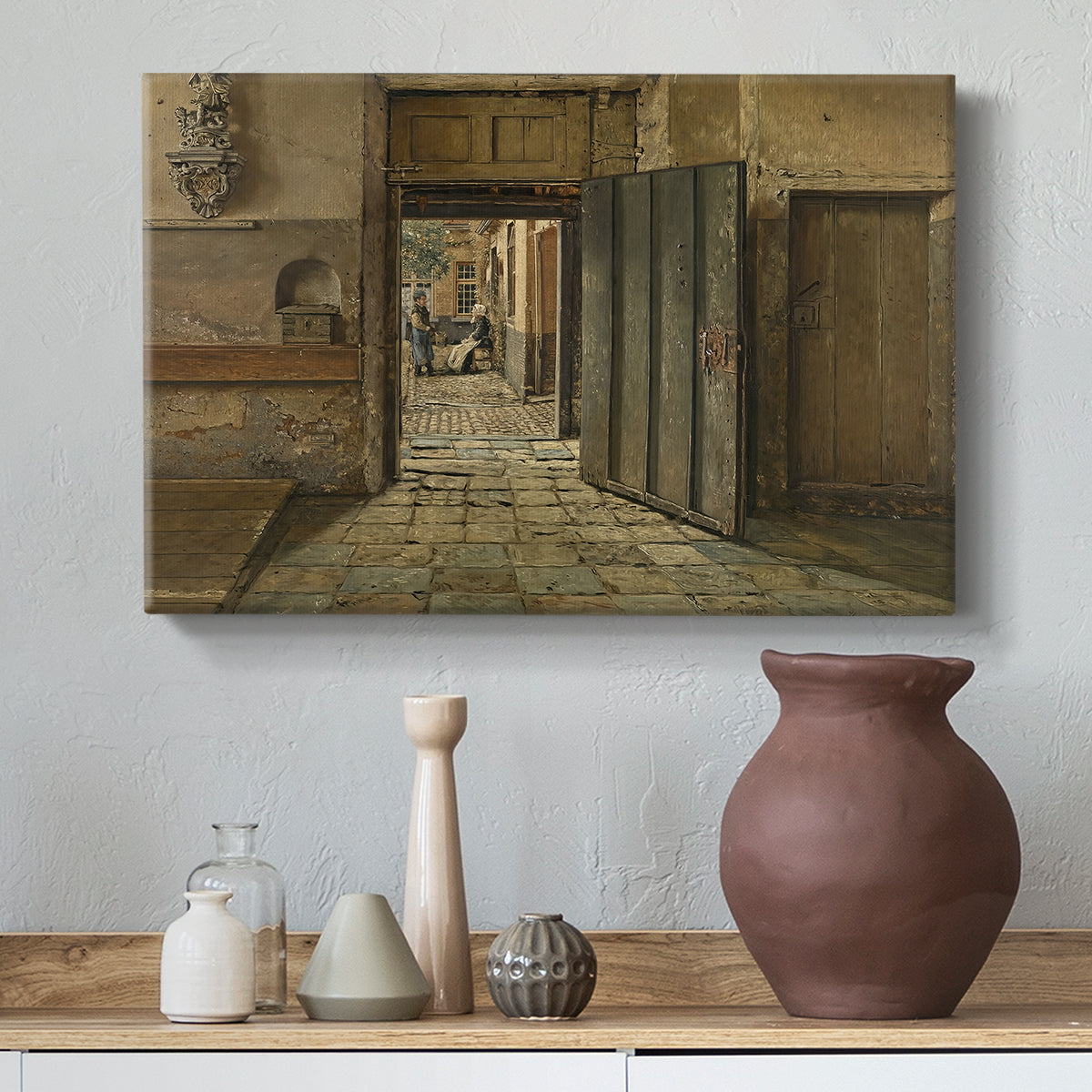 Canvas art print featuring a composition focusing on interaction within minimal space, styled above a decorative console