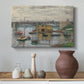 Canvas art print featuring a calm water scene with bridge fading into cloudy sky, styled above a decorative console
